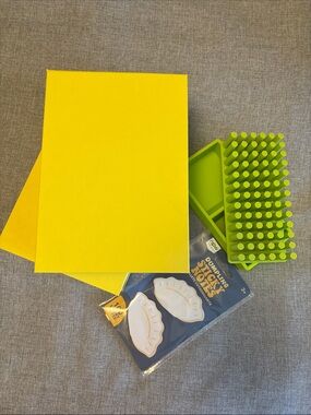 Desks set includes yellow storage boxes & Poppin accessories.
